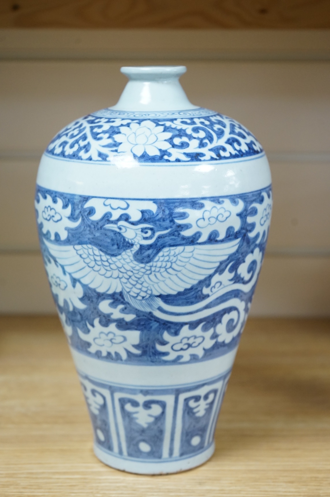 A Chinese blue and white phoenix vase, 27cm high